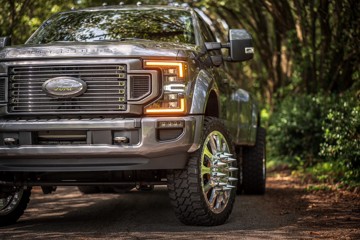 Close right view of Ford Super Duty truck's headlight