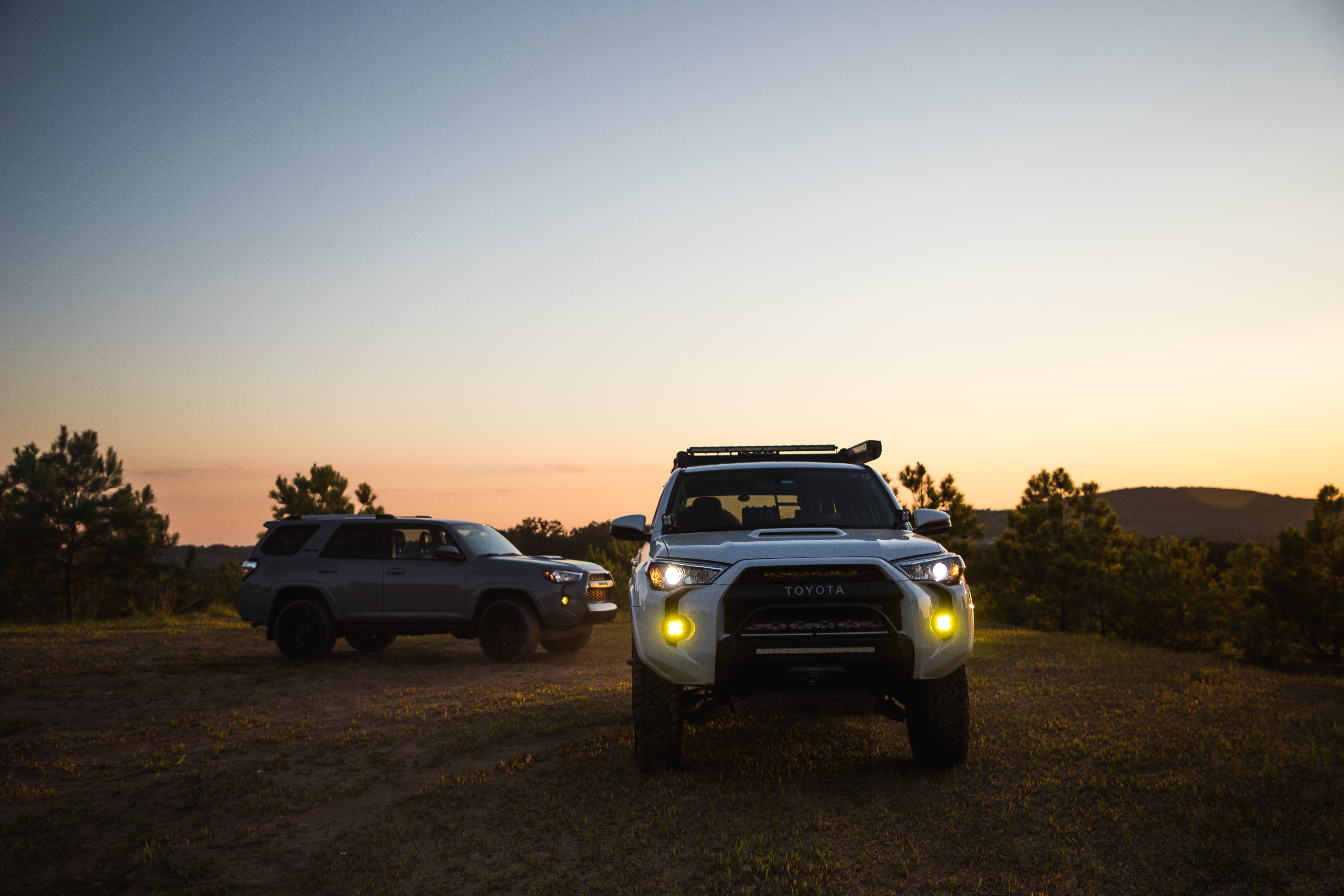 A Toyota Tundra parked in the desert with LED fog lights.