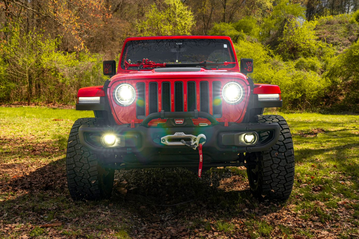 red-jeep-with-fog-lights